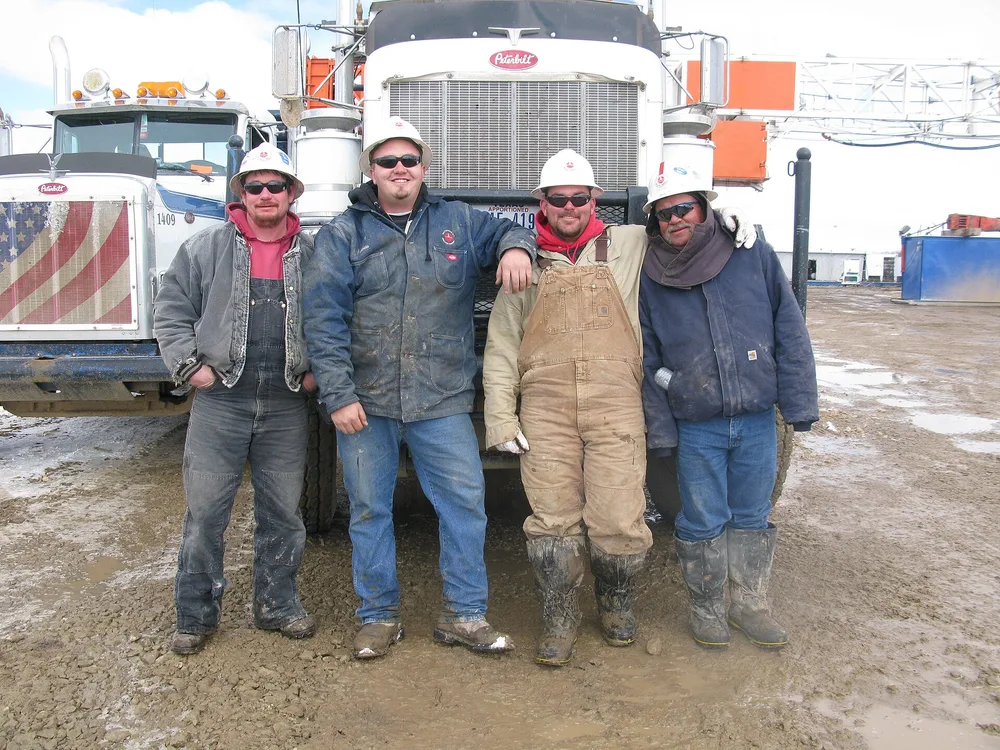 Mud-caked rubber boots worn by oil-rig workers