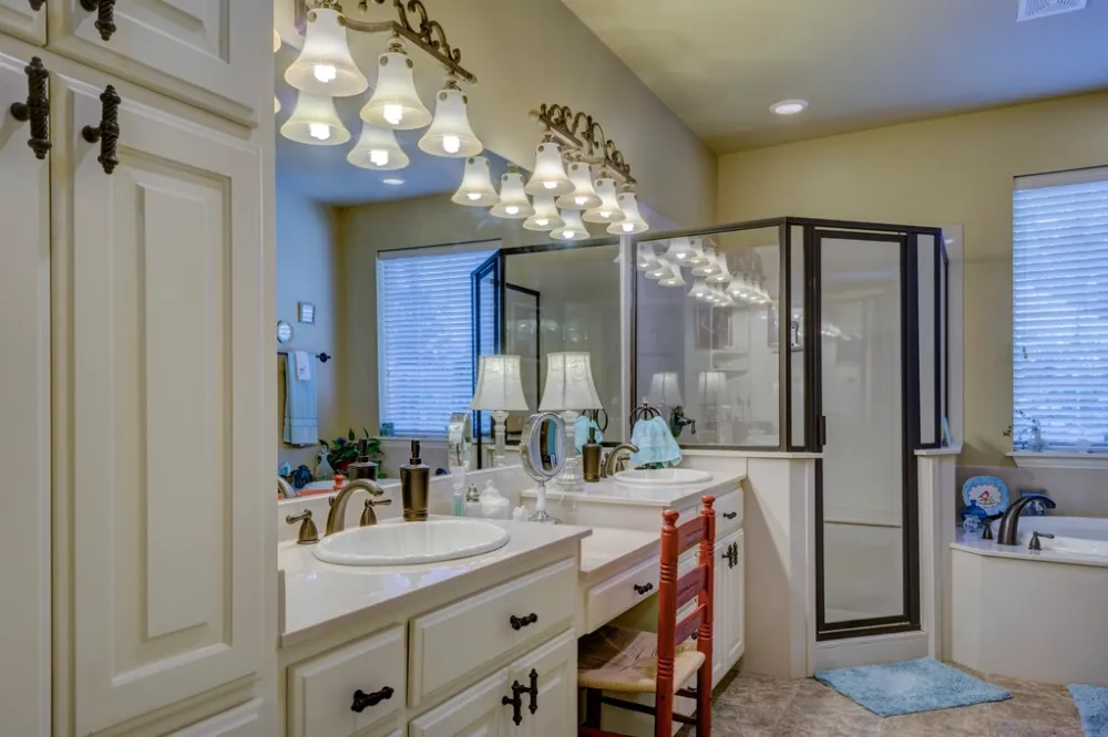 Modern bathroom with a shower and vanity — choosing the right water heater for the way you use it