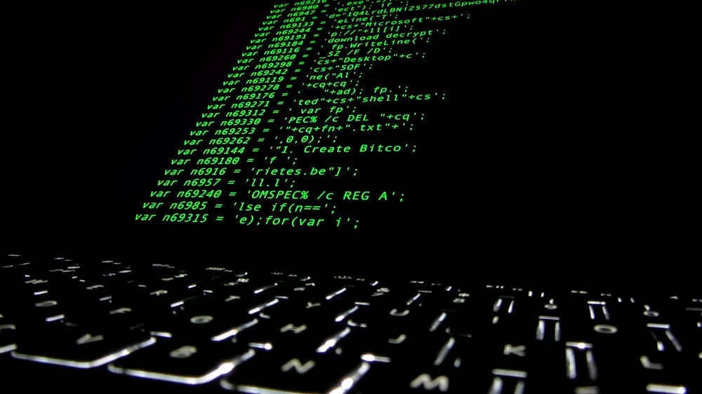 Illustration: ransomware code displayed on a computer screen