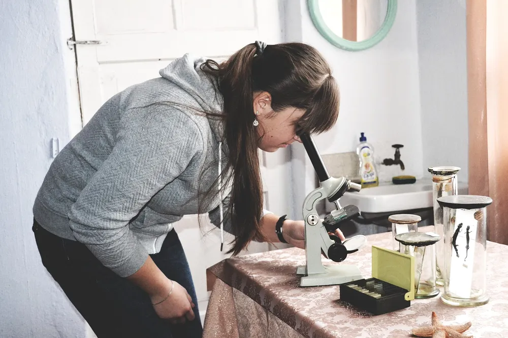Microscope and biology samples on a lab bench