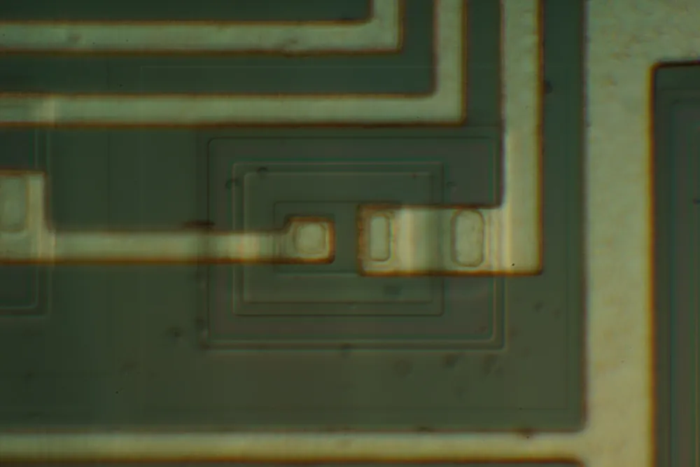 Illustrative: a microscopic view of an integrated circuit — Thailand aims to develop domestic semiconductor and electronics manufacturing capability through FastPass